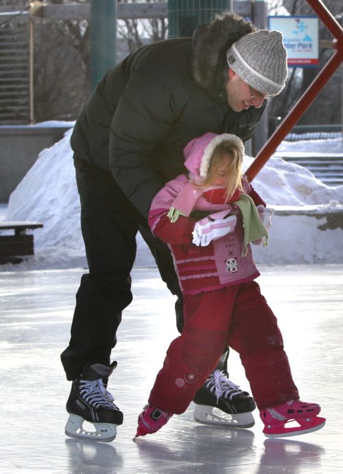 WAYNE.GLOWACKI@FREEPRESS.MB.CA Hang on Dad. Four year old Sofia Lamy gets support from her father Michel Lamy while skating with the family at The Forks Tuesday morning.  Winnipeg Free Press Jan 4 2011