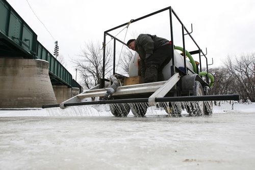 January 4, 2011 - 110104  - Virgil Bastien and Patrick Jordan (driving) flood the ice on the Red River at The Forks Tuesday, January 4, 2011.  John Woods / Winnipeg Free Press