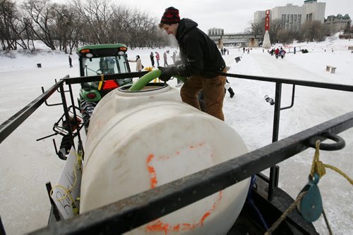 January 4, 2011 - 110104  - Patrick Jordan fills his tank with river water in preparation of flooding a rink at The Forks Tuesday, January 4, 2011.  John Woods / Winnipeg Free Press