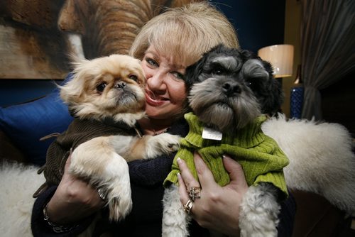 January 06, 2011 - 110106  - Barbara Camara cuddles with Naples (L)  and MJ, two of her six dogs, in her Winnipeg home Thursday, January 06, 2011.    John Woods / Winnipeg Free Press