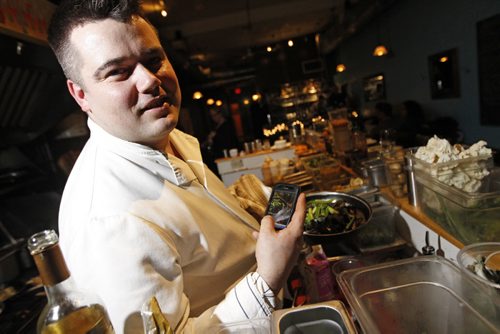 TREVOR HAGAN / WINNIPEG FREE PRESS - Chef/Owner Alexander Svenne of Bistro 7 1/4 on Osborne uses Twitter. Alex is giving a seminar next month on the benefits of social media from a restauranteur's perspective. 11-01-07