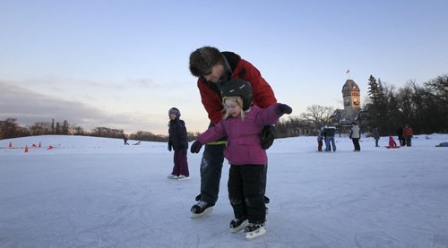 MIKE.DEAL@FREEPRESS.MB.CA 110108 - Saturday, January 08, 2011 - Stephen Atkison and his daughter Abbi, 4, take a spin on the newly renovated duck pond at the Assiniboine Park Saturday afternoon. MIKE DEAL / WINNIPEG FREE PRESS