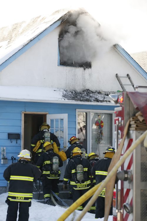 January 08, 2011 - 110108  -  Firefighters work on extinguishing a fire at 714 Flora Saturday, January 8, 2011.    John Woods / Winnipeg Free Press