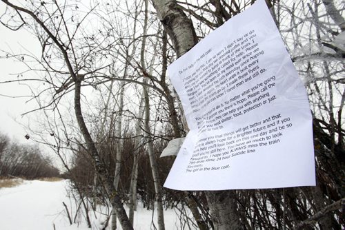 WAYNE.GLOWACKI@FREEPRESS.MB.CA Along the Harte Trail near Elmhurst Rd. is a paper taped to a tree saying...  "to the lady in red, I'm sorry I didn't stop to help you when you said you were going to jump in front of a train...i've been thinking of you. Signed lady in blue." For Lindor Reynolds story.    Winnipeg Free Press Jan. 10 2011
