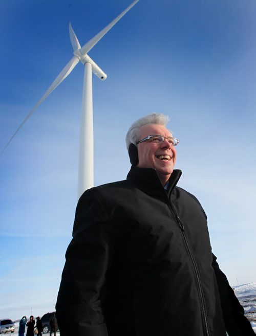 Ruth Bonneville Winnipeg Free Press Jan 11.2010 Local, Premier Greg Selinger is all smiles while at the base of one of the 7 turbines that were switched on on Manitoba's newest and largest wind farm near St. Joseph Tuesday.  These are the 1st of 60 turbines that will eventually provide enough energy to serve 50,000 homes.  See Larry's story.