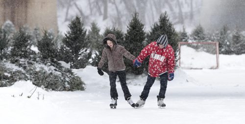 MIKE.DEAL@FREEPRESS.MB.CA 110113 - Thursday, January 13, 2011 - Molly Karp (left) and Ramy Penner (right) take a skate on the River Trail which is on the Red River and heads south towards Churchill Drive this year. MIKE DEAL / WINNIPEG FREE PRESS