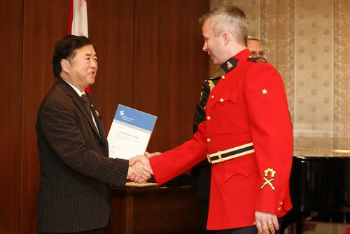 January 13, 2011 - 110113  -  Corporal Kevin Elliot receives the Lifesaving Society's Rescue Commendation Award from Philip Lee, the Lieutenant Governor of Manitoba, during the society's annual Rescue and Honour Awards at Government House Thursday January 13, 2011.    John Woods / Winnipeg Free Press