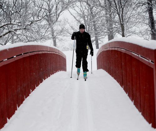 Ruth Bonneville Winnipeg Free Press Jan 14, 2010 Local Standup - John Maguire takes full advantage of all the snow while enjoying a late afternoon cross country ski run at the Windsor Park Nordic Ski Centre Friday afternoon.