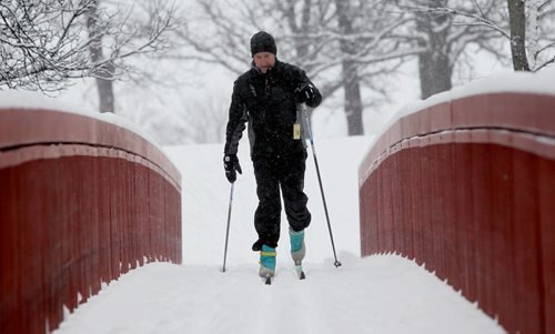Ruth Bonneville Winnipeg Free Press Jan 14, 2010 Local Standup - John Maguire takes full advantage of all the snow while enjoying a late afternoon cross country ski run at the Windsor Park Nordic Ski Centre Friday afternoon.