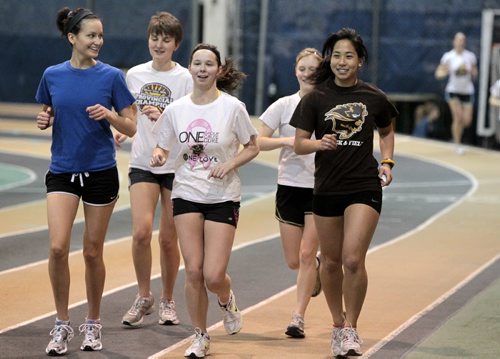 MIKE.DEAL@FREEPRESS.MB.CA 110201 - Tuesday, February 01, 2011 - Lisa Wong (right) training at Max Bell Fieldhouse for this weekends Bison Classic Track and Field meet. See Allan Besson's story. MIKE DEAL / WINNIPEG FREE PRESS