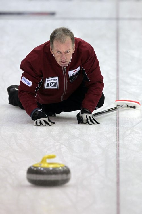 MIKE.DEAL@FREEPRESS.MB.CA 110208 - Tuesday, February 08, 2011 - Competitors in the Safeway Championship curling bonspiel in Beausejour, Manitoba practice on Tuesday, February 8, 2011. Skip Vic Peters throws a rock during practice. See Paul Wiecek story. MIKE DEAL / WINNIPEG FREE PRESS