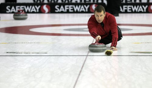 MIKE.DEAL@FREEPRESS.MB.CA 110208 - Tuesday, February 08, 2011 - Competitors in the Safeway Championship curling bonspiel in Beausejour, Manitoba practice on Tuesday, February 8, 2011. Skip Jeff Stoughton throws a rock during practice. See Paul Wiecek story. MIKE DEAL / WINNIPEG FREE PRESS