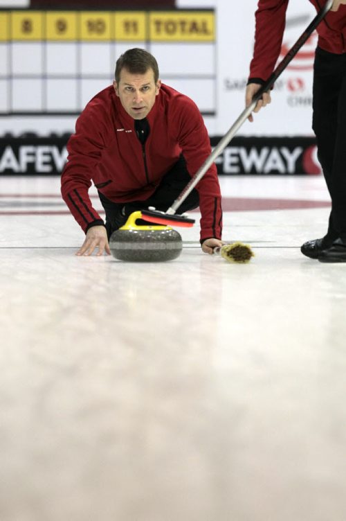 MIKE.DEAL@FREEPRESS.MB.CA 110208 - Tuesday, February 08, 2011 - Competitors in the Safeway Championship curling bonspiel in Beausejour, Manitoba practice on Tuesday, February 8, 2011. Skip Jeff Stoughton throws a rock during practice. See Paul Wiecek story. MIKE DEAL / WINNIPEG FREE PRESS
