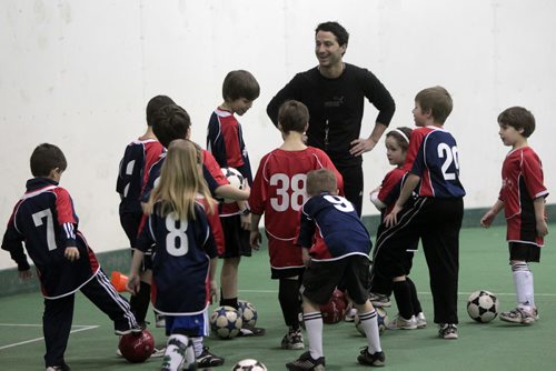 MIKE.DEAL@FREEPRESS.MB.CA 110208 - Tuesday, February 08, 2011 - Fabio Capone with Headstart Soccer and some kids in his program at Cover-all Sports in Headingley. See Malissa Martin story. MIKE DEAL / WINNIPEG FREE PRESS