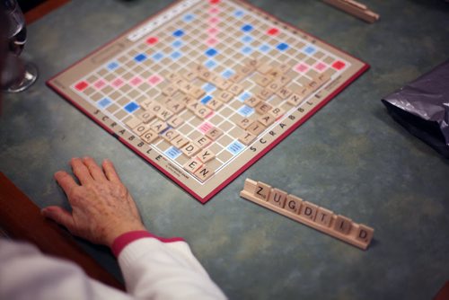 Brandon Sun 09022011 Joyce Hill ponders her next word during a game of Scrabble against Anne Wright on day three of the All Seniors Care Seniors Games at Victoria Landing Retirement Residence on Wednesday afternoon. Each day of the games is different with Wednesday offering a trivia challenge and a Crib and Scrabble tournament. The games wrap up Friday with Billiards and the closing and awards ceremony. (Tim Smith/Brandon Sun)