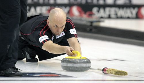 MIKE.DEAL@FREEPRESS.MB.CA 110210 - Thursday, February 10, 2011 - Competitors during the 12:15 draw on the first day of the Safeway Championship in Beausejour, Manitoba. Team Stoughton Third Jon Mead throws a rock. See Paul Wiecek story. MIKE DEAL / WINNIPEG FREE PRESS