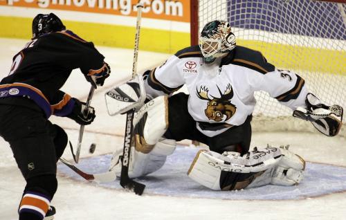 John Woods / Winnipeg Free Press / October 13, 2006 - 061013 - Philadelphia Phantoms David Printz (3) shoots to score the Phantoms first goal of the first period against Wade Flaherty (33) and the Manitoba Moose Friday, Oct 13/06.