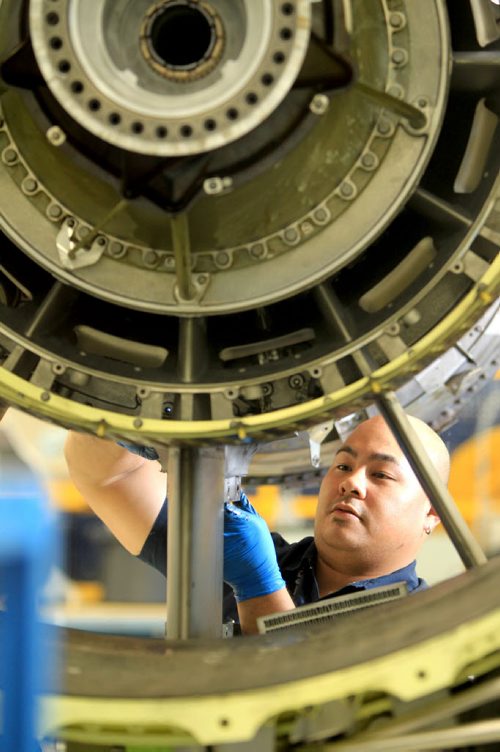 Ruth Bonneville Winnipeg Free Press Feb 15, 2011 Business,  Standard Aero aircraft engine mechanic Darnelle DeLeon works on a aircraft engine that is used in a Boeing 737 at Winnipeg plant.  For business story on how the company is building a new $50 million dollar engine testing facility in WInnipeg. Cash story.