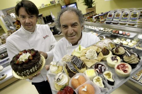 John Woods / Winnipeg Free Press / October 16, 2006 - 061016 - John Corona (L) and Ignazio Scaletta are partners in a Goodies bakery on Meadowood.  Photographed in their store with a selection of deserts Monday Oct 16/06.