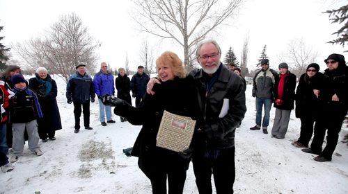 Ruth Bonneville Winnipeg Free Press Feb 19, 2022 Local, WIlma and Cliff Derksen are all smiles after handing out chocolate to everyone who attended ceremony in honor of their daughter Candace at her gravesite Saturday morning.