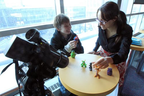 JOE.BRYKSA@FREEPRESS.MB.CA Local-(See King story)- Michelle Rosner of Freeze Frame, right, with student from Shaughnessy Park School Nicholas Hunt .They had a chance to  learn the basics of animation by making a simple character out of plasticine.It is This is just one of the many film techniques that will be featured at this years Festival, which takes place at Globe Cinema, Cinematheque and IMAX Theatre.- JOE BRYKSA/WINNIPEG FREE PRESS- Feb 22, 2011