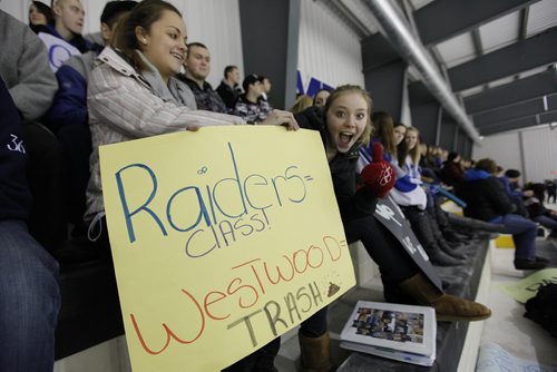 Winnipeg, Manitoba - 110304 - Oakpark grade 11 students Courtney MacDonald (L) and Johanna Lapointe show off a sign as Westwood Warriors and  the Oak Park Raiders of the Winnipeg High School League battle each other for a playoff spot in Winnipeg Friday, March 4, 2011. Westwood allegedly threw a game yesterday by pulling their goalie despite the fact that they were in the lead.  Their coach was suspended.(John Woods/Winnipeg Free Press)
