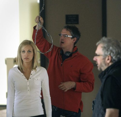TREVOR HAGAN / WINNIPEG FREE PRESS - Director, Declan O'Brien, middle, puts the noose around the neck of Samantha Kendrick, during filming on the set of Wrong Turn 4. The horror flick is being shot at the former Brandon Mental Health Institute in Brandon, Manitoba. 11-03-07