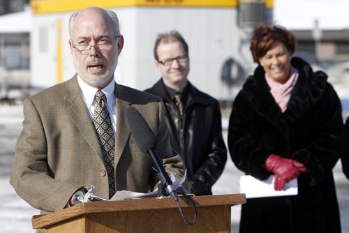 TREVOR HAGAN / WINNIPEG FREE PRESS - Chris Summerville, CEO of Schizophrenia Society of Canada speaks at a ground breaking event while Dr. Murray Enns and Health Minister, Theresa Oswald look on. Minister Oswald marked the beginning of construction on a unique mental health response centre located at the Health Sciences Campus. 11-03-15