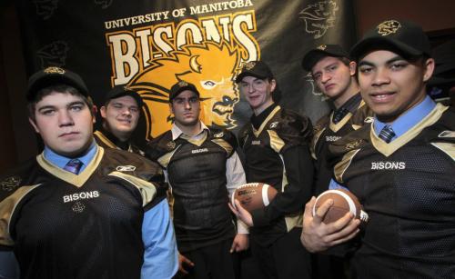 MIKE.DEAL@FREEPRESS.MB.CA 110317 - Thursday, March 17, 2011 - Six high school players who announced their commitment to the Bison football team, from left to right, Kieran Beveridge, Eric Dasset, Shahpour Birjandian, John Kiesman, Mitch MacKay and Nic Demski. MIKE DEAL / WINNIPEG FREE PRESS
