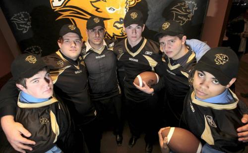 MIKE.DEAL@FREEPRESS.MB.CA 110317 - Thursday, March 17, 2011 - Six high school players who announced their commitment to the Bison football team, from left to right, Kieran Beveridge, Eric Dasset, Shahpour Birjandian, John Kiesman, Mitch MacKay and Nic Demski. MIKE DEAL / WINNIPEG FREE PRESS