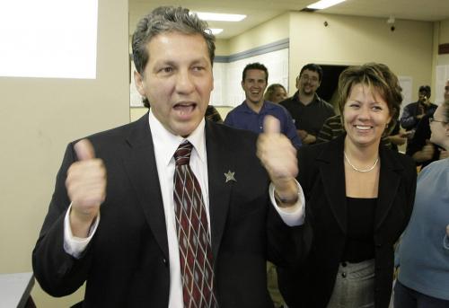 John Woods / Winnipeg Free Press / October 25, 2006 - 061025 - DAn Vandal with his wife Brigitte gives the thumbs up at his campaign office after election results show that he defeated Magnifico Wednesday Oct 25/06.