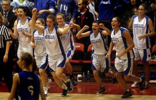 PHIL.HOSSACK@FREEPRESS.MB.CA 110321-Winnipeg Free Press River East Kodiak's storm off the bench after the team beat Oak Park Raiders in the Women's final of the MHSAA Mondy at the Duckworth Center. See Tait's tale.