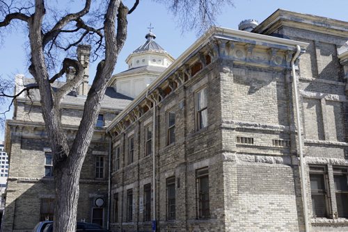 KEN GIGLIOTTI / WINNIPEG FREE PRESS / MARCH 23 2011- Kristen Verin-Treusch  (founder of Friends of Vaughan St. Jail) and does  Wpg street tours - portrait of her and the jail to go with Catherine MitchellÄôs fyi package on heritage bldgs.
