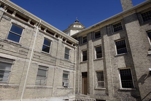KEN GIGLIOTTI / WINNIPEG FREE PRESS / MARCH 23 2011- Kristen Verin-Treusch  (founder of Friends of Vaughan St. Jail) and does  Wpg street tours - portrait of her and the jail to go with Catherine MitchellÄôs fyi package on heritage bldgs.