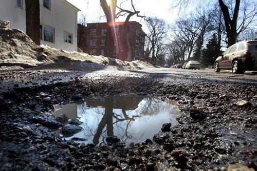 WAYNE.GLOWACKI@FREEPRESS.MB.CA A pothole on Jessie Ave. near Nassau St. N. for  Jen Skerritt story. Winnipeg Free Press  March 28 2011 Winnipeg Free Press  March 28 2011