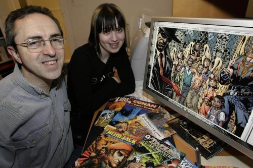 John Woods / Winnipeg Free Press / October 30, 2006 - 061030 - Comic artist Loverne Kindzierski and his daughter Holly pose with some of their creations in their home studio Monday Oct 30/06.
