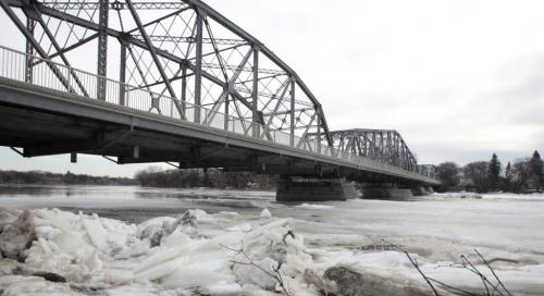 MIKE.DEAL@FREEPRESS.MB.CA 110407 - Thursday, April 07, 2011 - The Redwood bridge from the southwest side. An ice jam is forming at the Redwood Bridge in Winnipeg this morning. River levels are rising in the city but Amphibex machines are on standby for spot duty in the city if needed. MIKE DEAL / WINNIPEG FREE PRESS