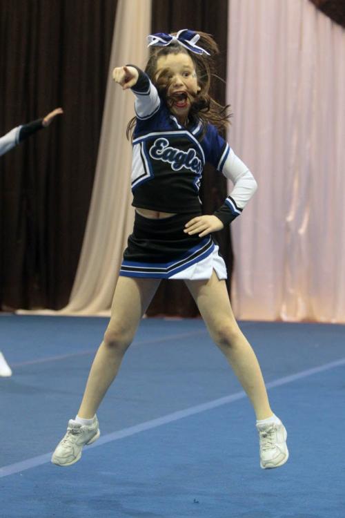 MIKE.DEAL@FREEPRESS.MB.CA 110409 - Saturday, April 09, 2011 - The Bison Cheer Grand Championship being held this weekend at the Investors Group Gym at the University of Manitoba. Jenna Reinisch, 12, performs with the Winnipeg Eagles Jr. Cheer Team.  MIKE DEAL / WINNIPEG FREE PRESS
