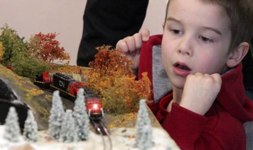 MIKE.DEAL@FREEPRESS.MB.CA 110409 - Saturday, April 09, 2011 - The Winnipeg Model Railroad Club spring show was at Westworth United Church on Saturday. Carson Pickel, 5, watches as the cars roll past. MIKE DEAL / WINNIPEG FREE PRESS