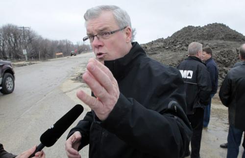 MIKE.DEAL@FREEPRESS.MB.CA 110409 - Saturday, April 09, 2011 - Premier Greg Selinger had a quick tour of dike preparations in St. Adolphe this morning. The town is preparing to close its dike this weekend.  MIKE DEAL / WINNIPEG FREE PRESS