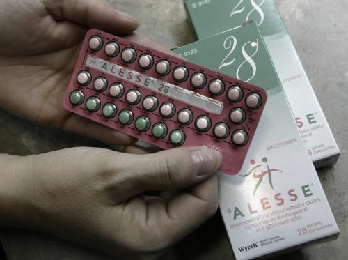 John Woods / Winnipeg Free Press / November 1, 2006 - 061101 - Lisa Goss, a reproductive health co-ordinator at Klinic, displays a package of the birth control pill Allesse Wednesday, Nov. 1/06.  Allesse is in short supply in Canada.