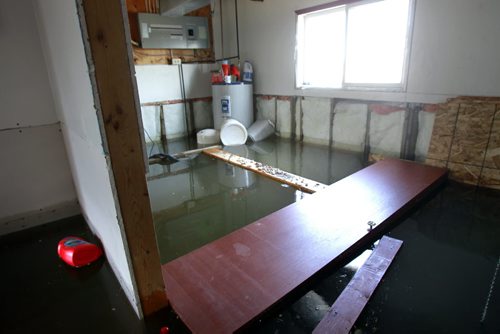 WAYNE.GLOWACKI@FREEPRESS.MB.CA  The flooded basement in the bilevel home of Eddie Thomas on the Peguis First Nation Community after flooding from the Fisher River. Melissa Martin story Winnipeg Free Press April 14  2011