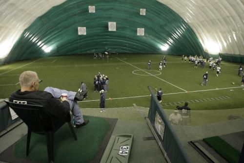 John Woods / Winnipeg Free Press / November 3, 2006 - 061103  - Lyle Baurer, Bomber GM watches the Bombers practice from the top level at the Golf Dome on Taylor Ave. Friday, Nov 3/06.