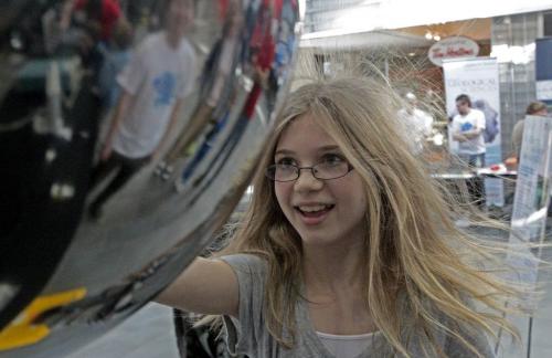 MIKE.DEAL@FREEPRESS.MB.CA 110507 - Saturday, May 07, 2011 -  Margaret Gehman, 13, checks out a hair raising display at the Science Rendezvous festival at the UofM Fort Garry campus. The festival is held across Canada to promote science culture and literacy. MIKE DEAL / WINNIPEG FREE PRESS