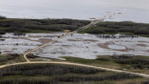 MIKE.DEAL@FREEPRESS.MB.CA 110512 - Thursday, May 12, 2011 -  Flood Flight The three Shoal Lakes have essentially merged into one large lake just east of Lake Manitoba overflowing its banks and flooding surrounding roads and farmlands. MIKE DEAL / WINNIPEG FREE PRESS