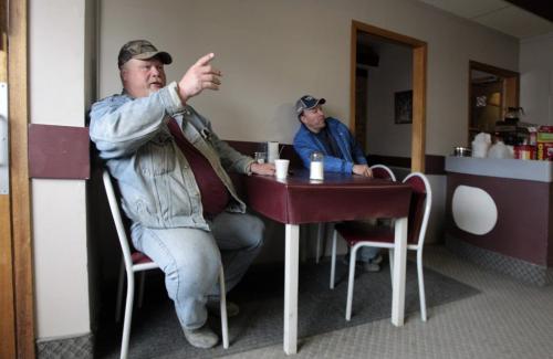 MIKE.DEAL@FREEPRESS.MB.CA 110513 - Friday, May 13, 2011 -  Glen Fossay (left) and Marc Painchaud (right) at the local watering hole the Starbuck Hotel.  See Lindor Reynolds story MIKE DEAL / WINNIPEG FREE PRESS