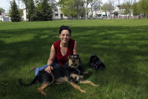 BORIS.MINKEVICH@FREEPRESS.MB.CA   BORIS MINKEVICH / WINNIPEG FREE PRESS 110520 Talia Syrie and her lovely dog named xxx pose for a photo in Michaelle Jean Park in North Point Douglas.