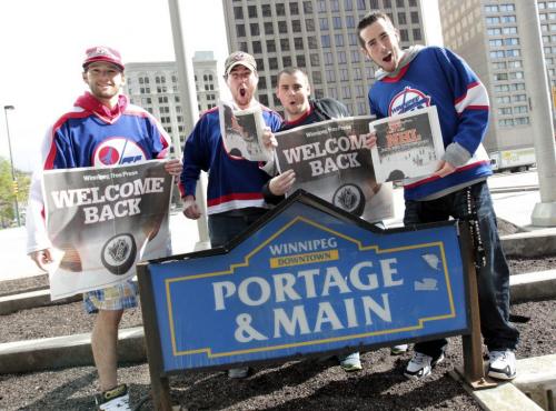 MIKE.DEAL@FREEPRESS.MB.CA 110531 - Tuesday, May 31, 2011 -  Hockey fans gathered at Portage and Main to celebrate the return of the NHL to Winnipeg, MB. (l-r) Mark Patton, Dana Judd, Damien Lemoine and Miguel Marcoux arrived early at Portage and Main for the party. MIKE DEAL / WINNIPEG FREE PRESS