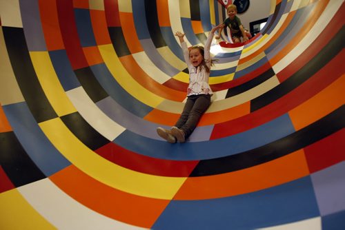KEN GIGLIOTTI / WINNIPEG FREE PRESS / June 1 2011 - Carolyn Vesley story- Children's Museum  getting ready to reopen with new galleries  and Grand Opening June 4- in pic Emily Cox age 6 slides down Illusion Tunnel slide