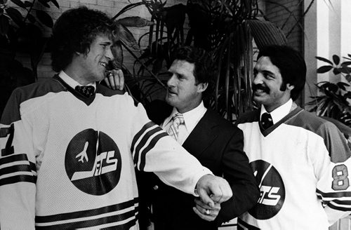 Winnipeg Free Press / Paul Deleske / Sept 7 1978 (year not clear on photo) -in pic  WHA Jets coach Larry Hillman  with   Jets Scott Campbell #7 left and Terry Ruskowski  #8- *** Important photo the Jets under GM John Ferguson elected to protect Campbell and Morris Lukowich the year they entered the NHL - this was a contraversial  choice-  Photo Book Project - Wpg Winnipeg Jets Hockey Club - NHL National Hockey League return -  ( kgjets brings up all Wpg Jets recovered photos in Merlin )  photos cannot be  published without written permission from the Winnipeg Free Press and credit must include  the Winnipeg Free Press and photographer with each photo